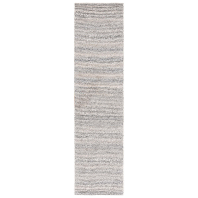 Tapis touffeté à la main