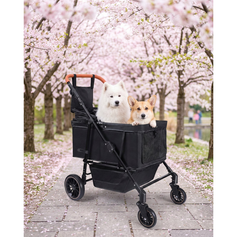 Poussette pour chien pouvant accueillir de grandes et moyennes races (20 à 132 livres) ou deux petits chiens; est livré avec une poignée réglable et un auvent; comporte des parasols et un organisateur de rangement; conception pliable et ventilée; noir.