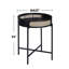 Table de bout ronde avec pieds en métal à finition ouverte seulement la table, sans chaises.