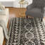 Tapis noir / kaki / brun foncé en jute à motif géométrique Brookland-906845673