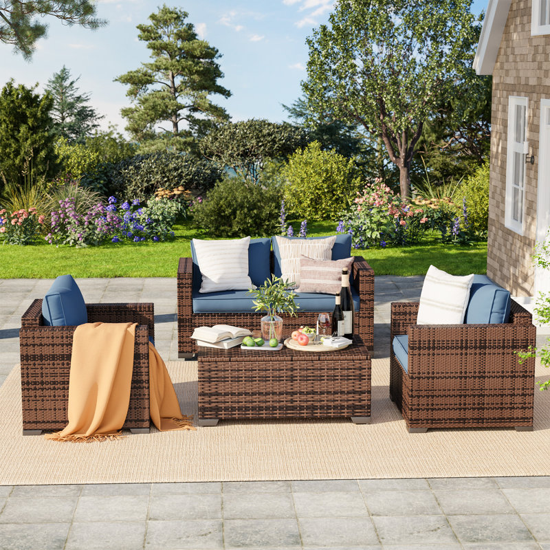 Azoriah Wicker 4 - Person Outdoor Seating Group with Storage, Navy Blue