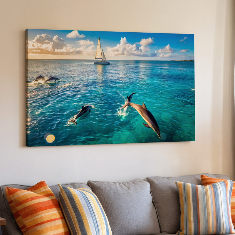 Toile, une scène sereine de l'océan mettant en vedette des dauphins ludiques qui sautent gracieusement à travers une eau turquoise transparente