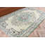 Tapis turc fabriqué à la main dans des couleurs pastel pour la décoration de salon avec art bohème et éléments verts naturels