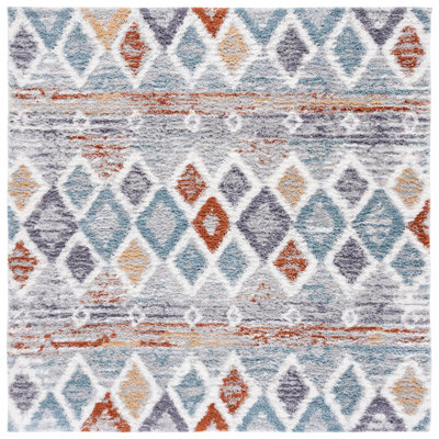 Evangelyn Geometric Blue Rust/Ivory Area Rug