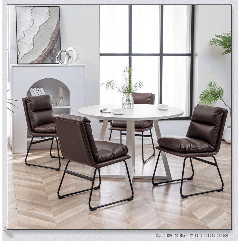 Ensemble de salle à manger rond 5 pièces avec table à tréteaux et chaises élégantes Innes, parfait pour les petits espaces et les rassemblements élégants