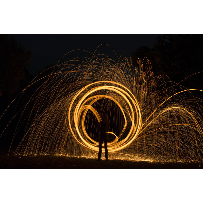 Sparks Flying Off Burning Steel Wool by Sparks Flying Off Burning Steel Wool - Wrapped Canvas Print