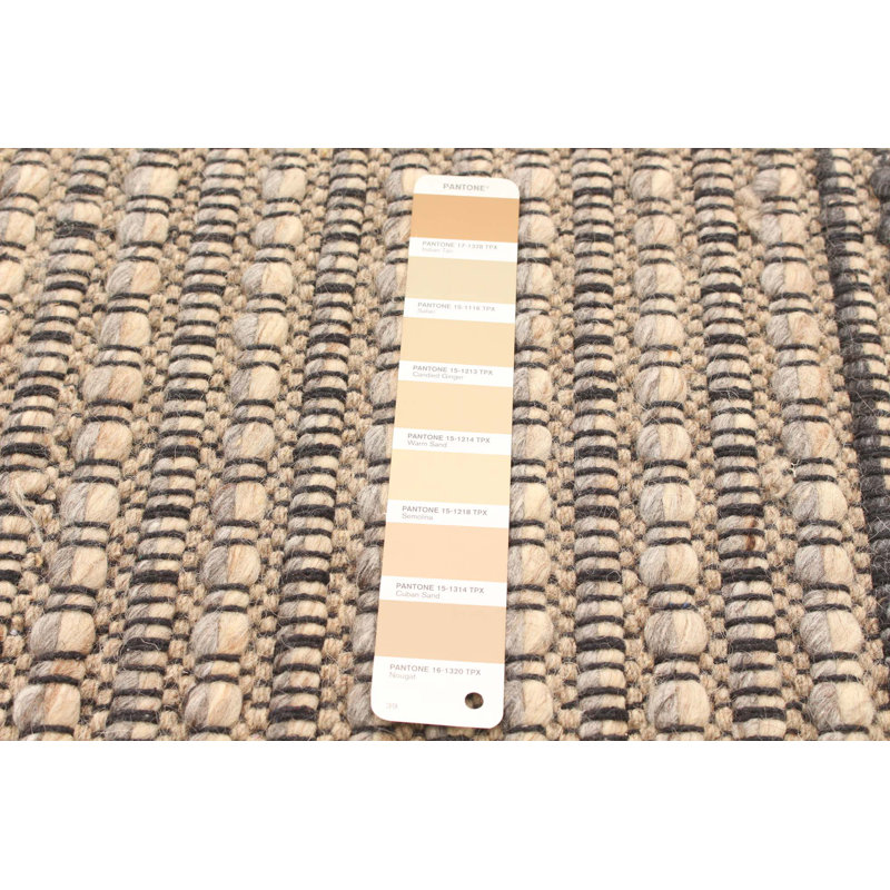 Tapis décoratif en laine brun clair tressé à la main à rayures