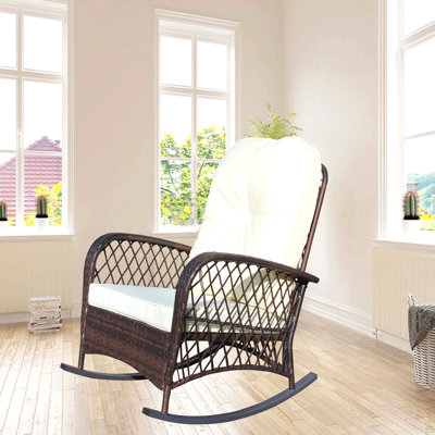 Chaise berçante d'extérieur en osier à assise large, coussin épais et moelleux