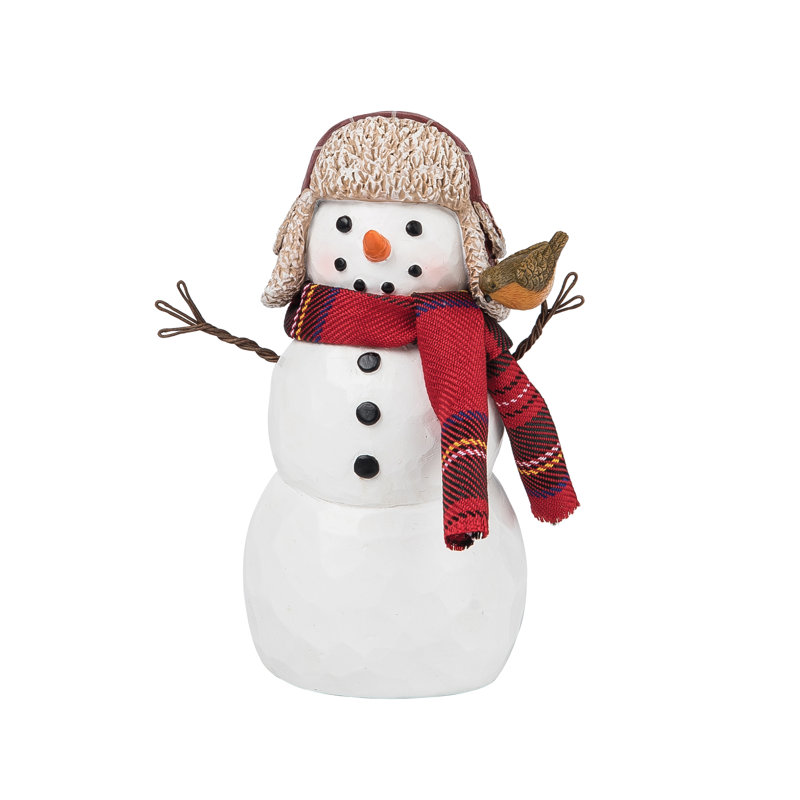 Figurine bonhomme de neige avec oiseau