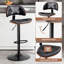Tabouret de bar pivotant et réglable en hauteur avec repose-pieds-340149718-356919262