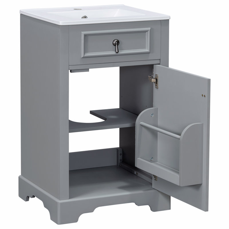 Meuble-lavabo de 20 pouces avec lavabo en céramique, porte à fermeture douce, tablette réglable et support de rangement fixé à la porte