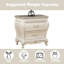 Magnifique table de chevet blanc perle avec garniture en granit et compartiment de tiroir abondant Magnifique comptoir en granite offrant beaucoup de rangement pour les articles de chambre à coucher