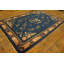 Tapis antique chinois à motif floral et médaillon des années 1920