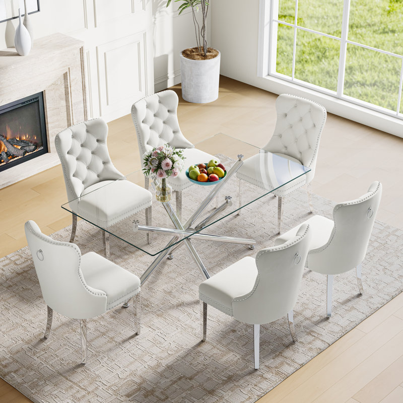 Ensemble de salle à manger moderne 7 pièces - Table rectangulaire en verre avec base en miroir en métal et 6 chaises rembourrées en velours