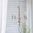 Suspended luminaire with adjustable chain