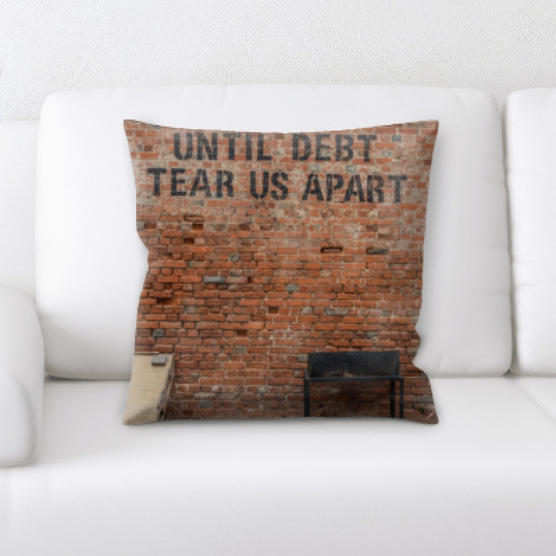 Coussin décoratif jusqu’à la dette