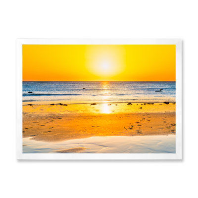 " Sunset On Beautiful Sand Beach With Blue Sea Water "