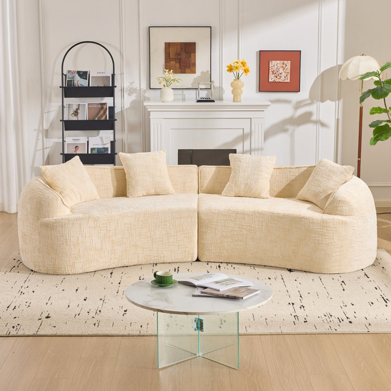 Canapé beige courbé et compressé, conception créative de style nordique pour le salon, confortable, doux et adapté à de multiples cas de figure