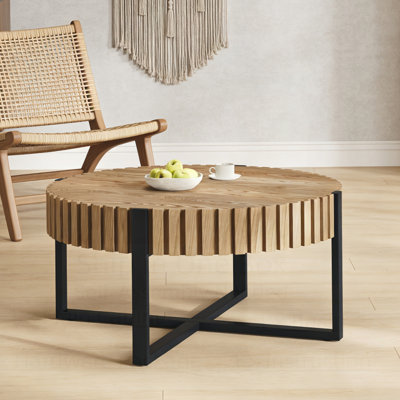 Table basse circulaire robuste et élégante avec un design industriel et une capacité de charge élevée, parfaite pour les espaces de vie modernes