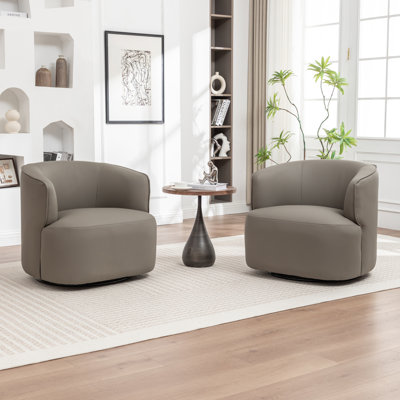Tybias Faux Leather Swivel Barrel Chair