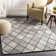 Lynden Geometric Handmade Tufted Beige/Gray Area Rug
