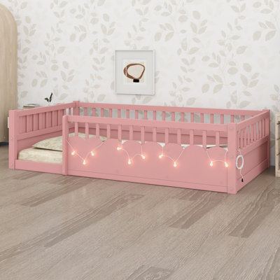 Kids floor bed with guardrails, cloud panels and light accents for modern bedrooms