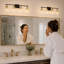 Miroir de salle de bain 30,5 po à 4 lumières câblées avec miroir pour salle de bain style moderne noir et laiton clair-129912874