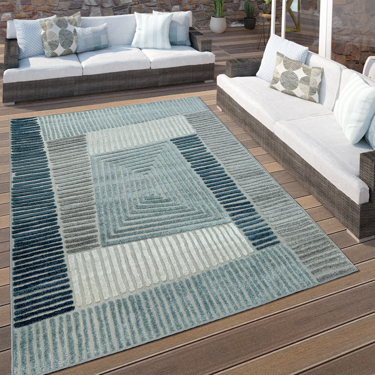 Tapis bleu en polypropylène tissé à la machine Bethanee