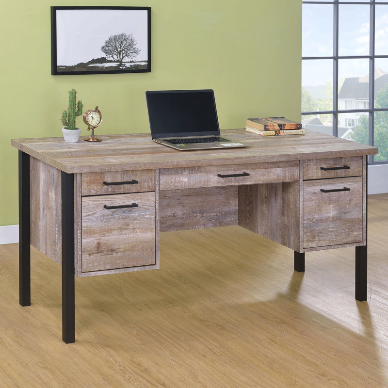 Bureau en chêne patiné à 4 tiroirs