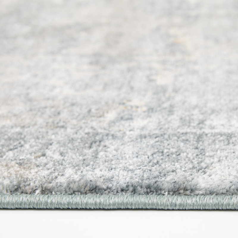 Tapis tissé abstrait bleu et blanc Fion, 26 po x 6 pi