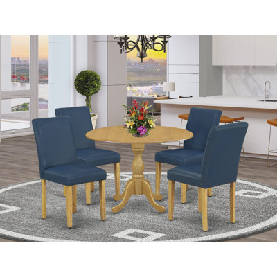 L'ensemble de salle à manger 5 pièces comprend une table de salle à manger ronde avec Dropleaf et 4 chaises Parson revêtues de similicuir bleu Oasis, en chêne