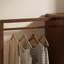 Armoire d'entrée tout-en-un à finition noyer de 66,93 po avec miroir pleine longueur, porte-manteau et range-chaussures
