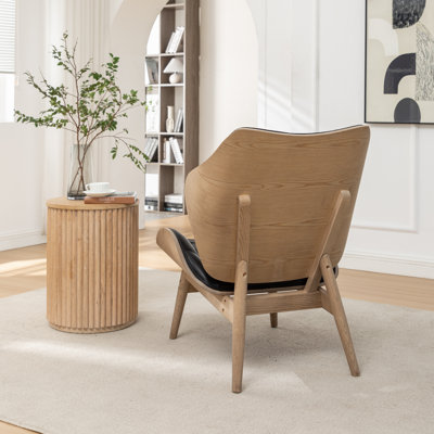 Fauteuil à oreilles capitonné Jeyshan