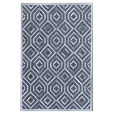 Tapis gris/blanc handwoven à tissage plat vache Simeon
