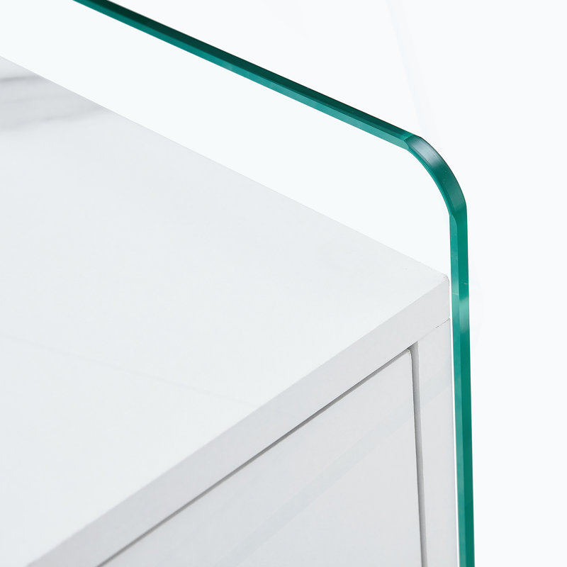 Double-drawer bedside table. The board surface is MDF with white grain sticker, and both sides are transparent tempered glass. The design is simple and elegant, with excellent storage functions.