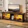 Aaleigha TV Stand Cabinet with Power Outlets 140CM Modern TV Unit with Glass Shelf RGB LED Lighted for 65" TVs
