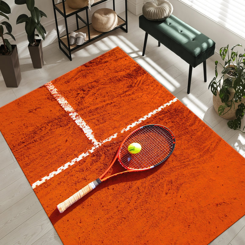 Tapis à poils doux avec motif géométrique rouge et bleu éclatant, idéal pour ajouter une touche de couleur à tout espace de vie