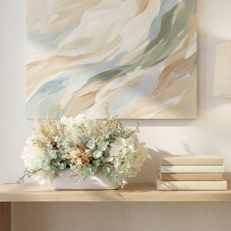 Centre de table printanier avec hortensias, eucalyptus et pampas