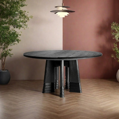 Black round ash wood dining table