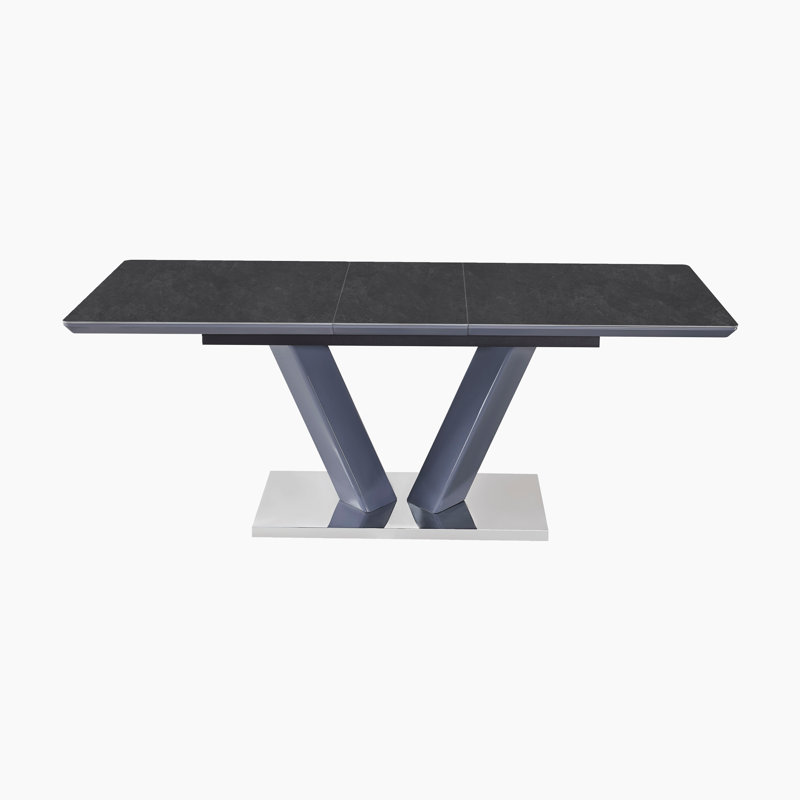 Table de salle à manger rectangulaire extensible Speece 63 po, de style moderne et contemporain, en pierre frittée, avec rallonge papillon intégrée, support en V et plaque de base chromée, 6 couverts, fini noir