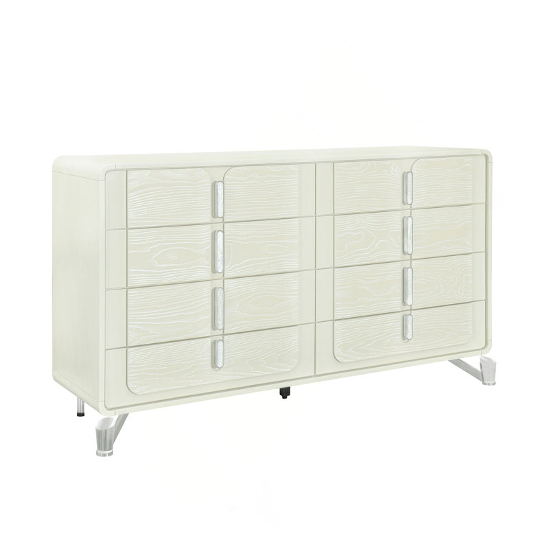 La commode et la commode avec une finition en bois clair et des poignées encastrées combinent un style minimaliste avec un rangement de chambre peu encombrant