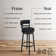 Deherrera Modern Swivel Counter or Bar Stool with Open Low Back and Footrest in Metal and Faux Leather