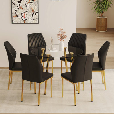 Table and chair set.39.7 Inch Diameter Modern Luxury Glass Dining Table and Chair Set - Gold Metal Legs.Paired With 4 BLACK PU Material High Resilience Dining Chair with Metal Gold Leg.