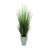Herbe de feuillage artificiel dans un pot de fleurs-808771760