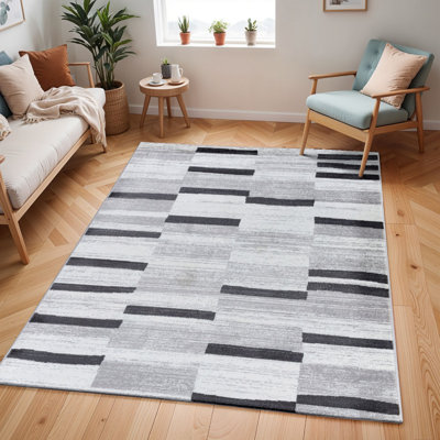 Beyanka Abstract Machine Tufted Area Rug
