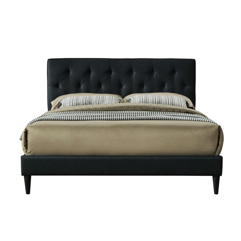 Lit double tapissier dans une boîte avec tête de lit et revêtement en tissu noir