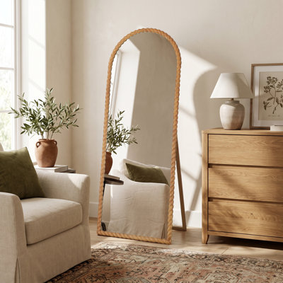 Miroir mural en bois sculpté