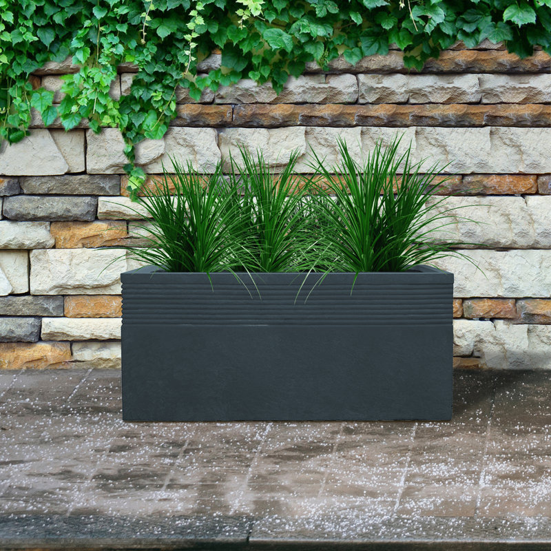 Boîte à fleurs en béton
