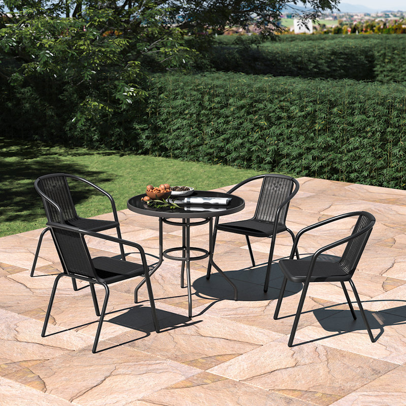 Behr 4 - Person Patio Dining Set with Round Table