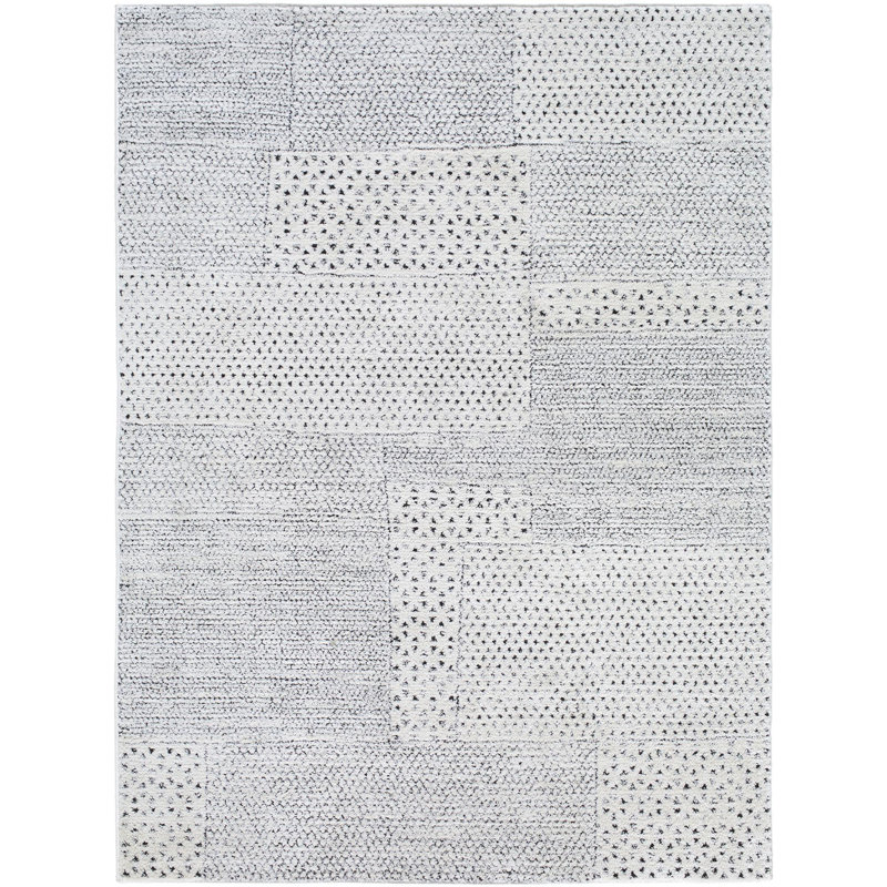 Ivory and Black Geometric Patchwork Area Rug, 6'7" x 9'
